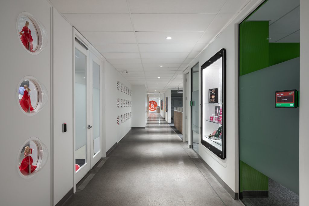 High-quality architectural millwork featuring custom wood paneling, commercial cabinetry, architectural doors, and contemporary office finishes.