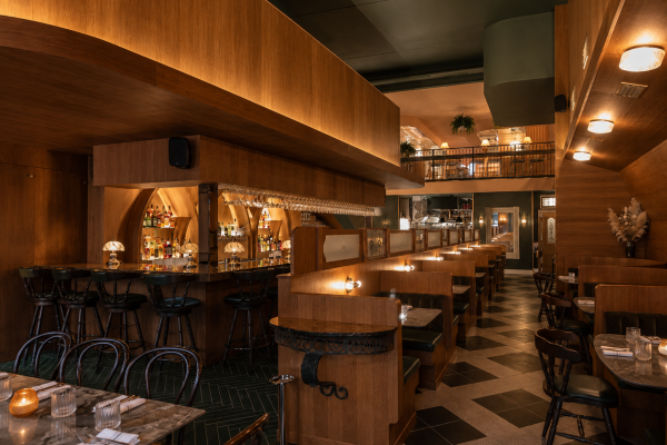 Architectural commercial millwork for restaurants including custom wood wall cladding, restaurant cabinetry, feature bar systems and bespoke booth seating.