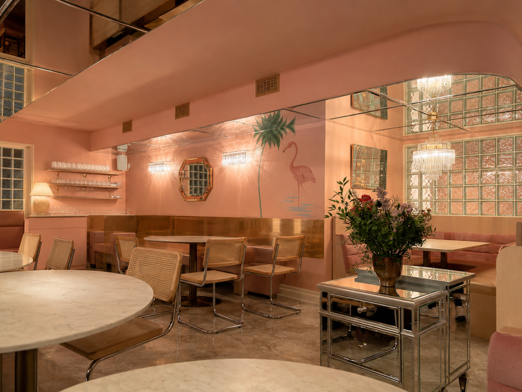 Custom hospitality millwork including restaurant cabinetry, architectural wood wall cladding, built-in booth seating, feature wood ceilings and luxury interior finishes.