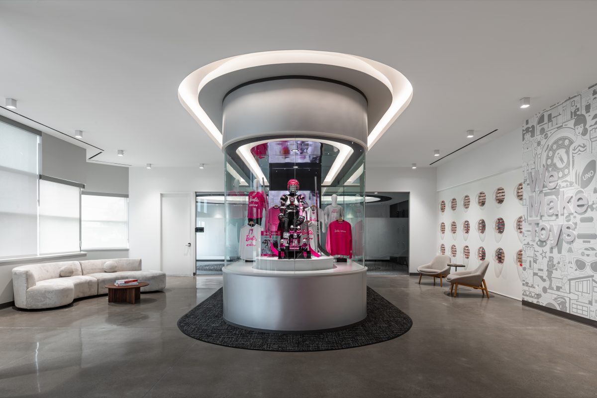 Custom commercial millwork package including architectural woodwork, cabinetry, paint-grade finishes, slat wall systems, and integrated workplace interiors.
