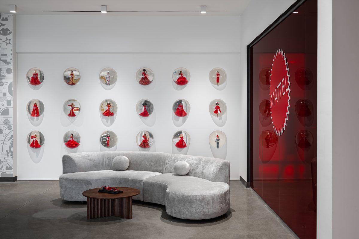 Contemporary corporate office featuring architectural millwork, custom cabinetry, wood slat walls, architectural wood finishes, and modern interior design.