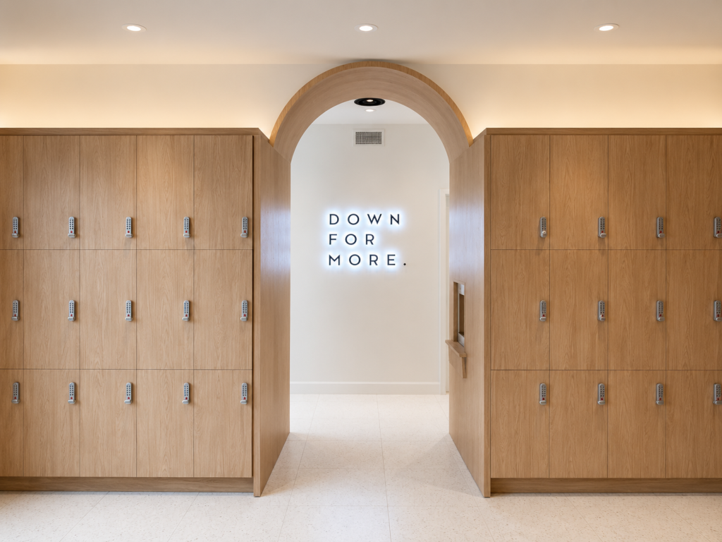 Custom commercial locker systems manufactured by Boreal Architectural featuring premium architectural millwork, integrated storage, durable wood cabinetry, and contemporary wellness facility finishes.
