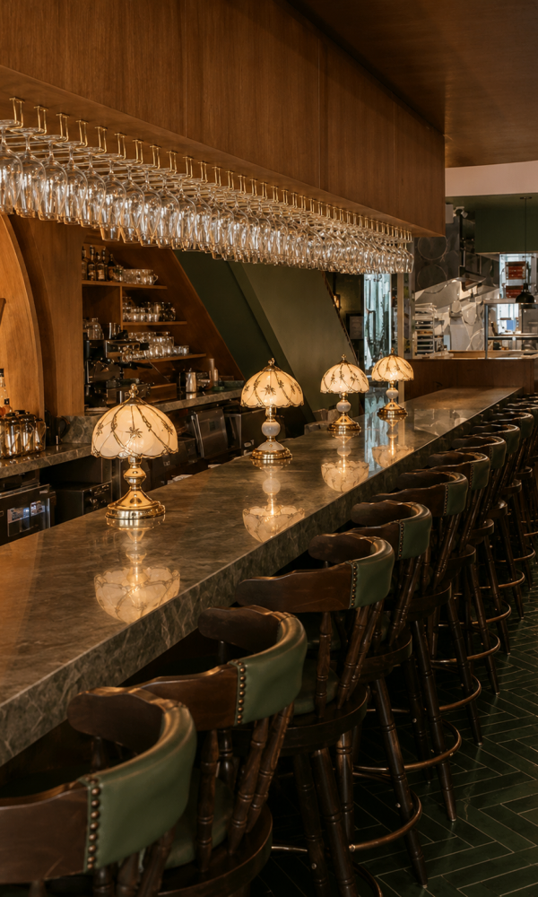ommercial hospitality interior with custom restaurant millwork, premium wood wall cladding, architectural cabinetry, feature ceilings and custom booth seating.