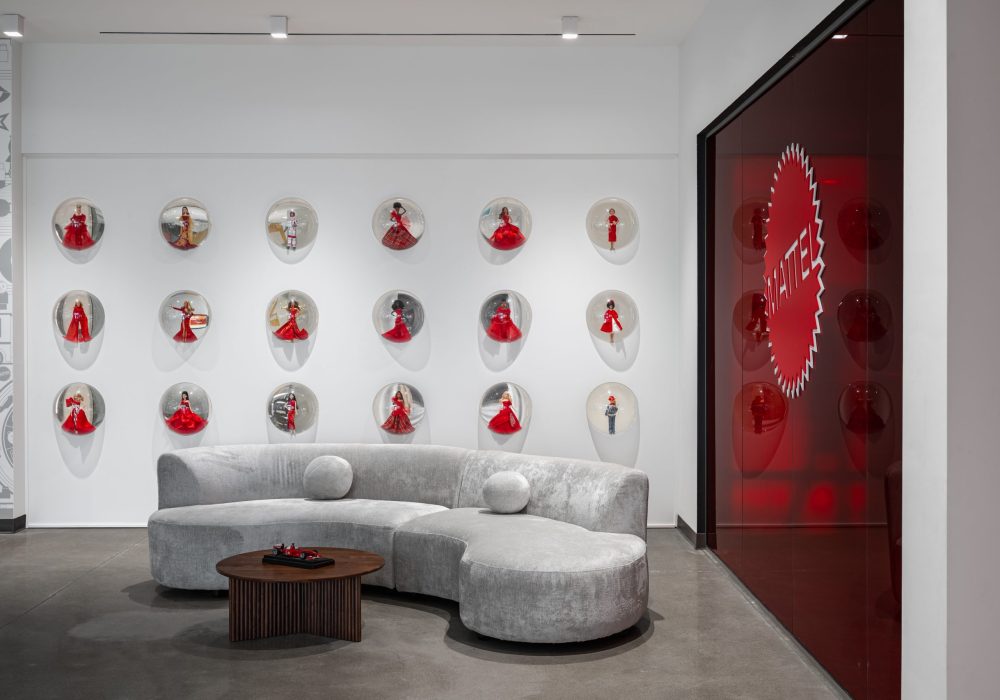 Contemporary corporate office featuring architectural millwork, custom cabinetry, wood slat walls, architectural wood finishes, and modern interior design.